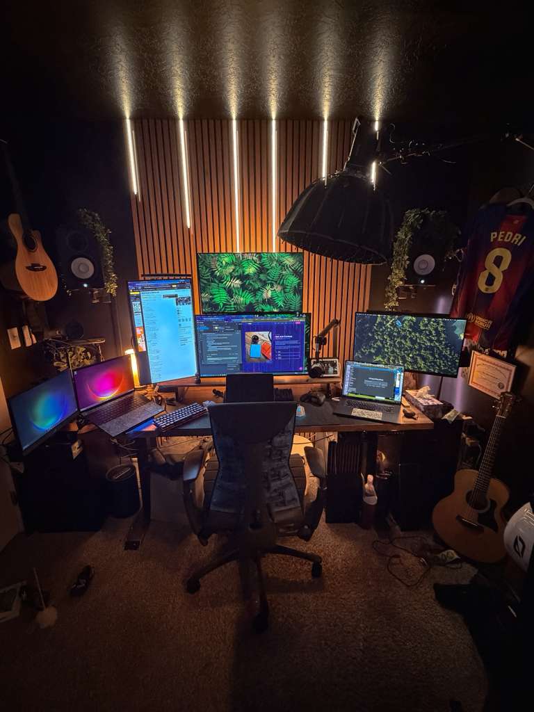 Richie's command center — multi-monitor AI development setup